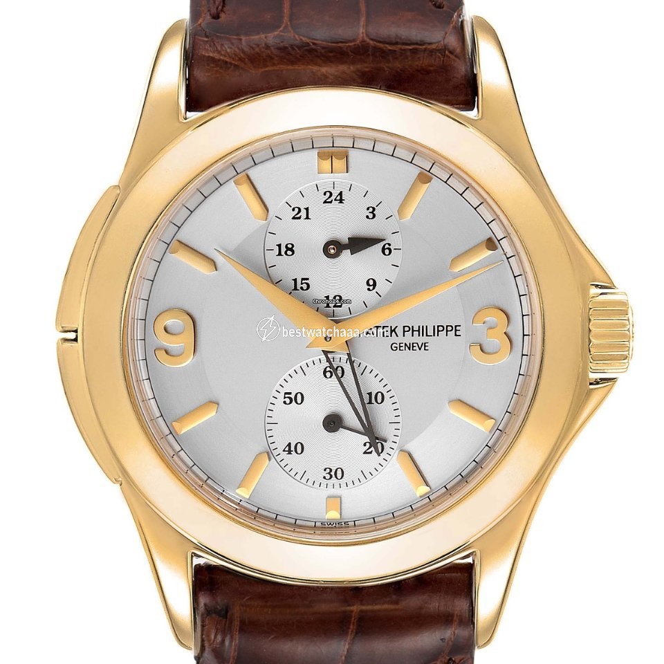 Patek Philippe Travel Time Mens watch Unisex Manual winding Yellow gold 5134J