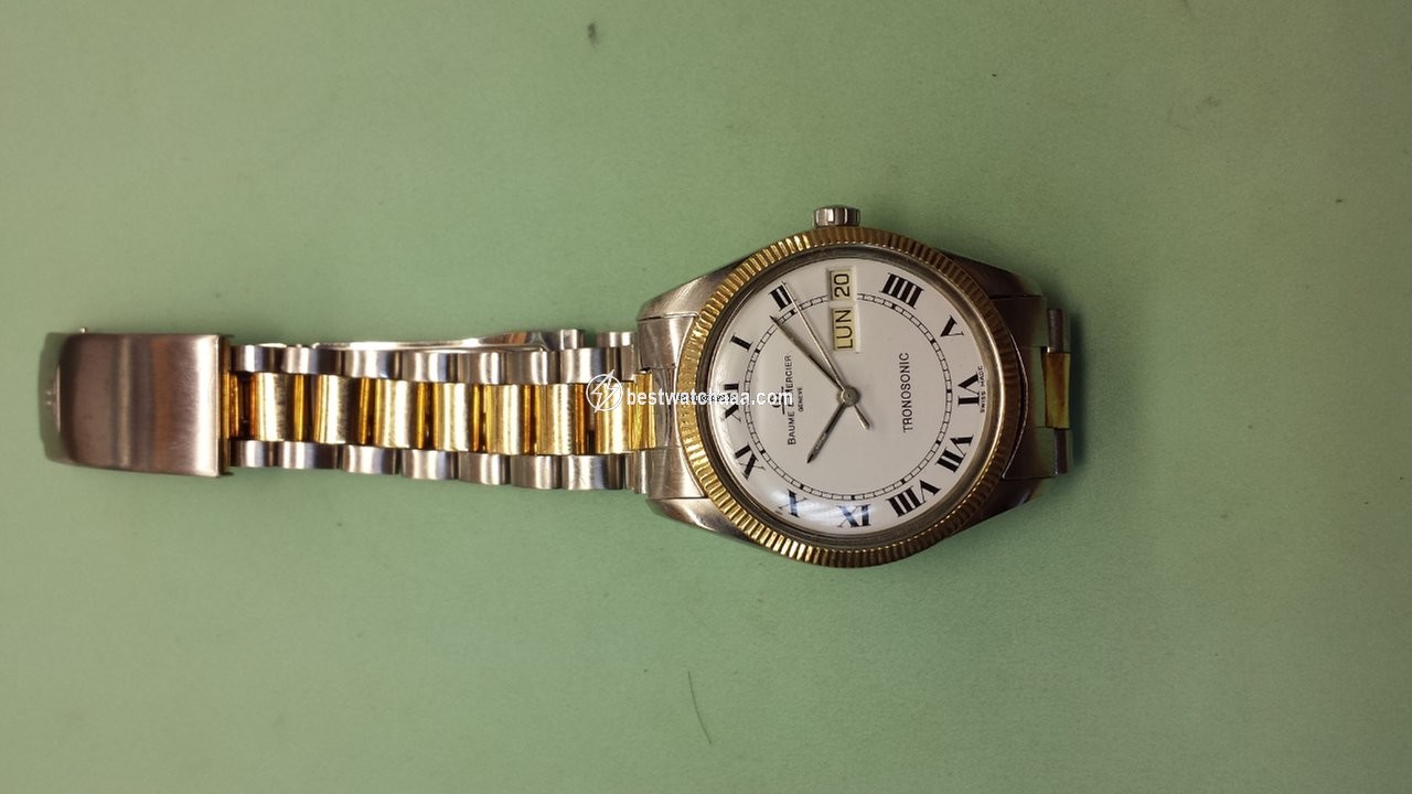 Baume & Mercier Mens watch Unisex Quartz Gold Steel 5101